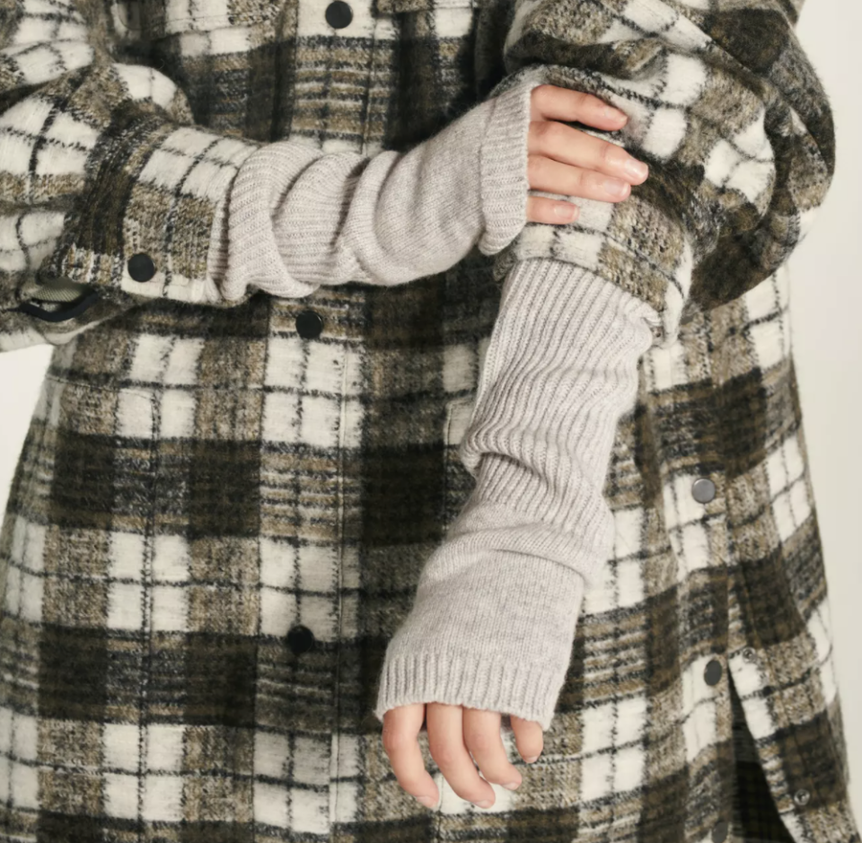 Neutral-tone fingerless gloves with flannel shirt