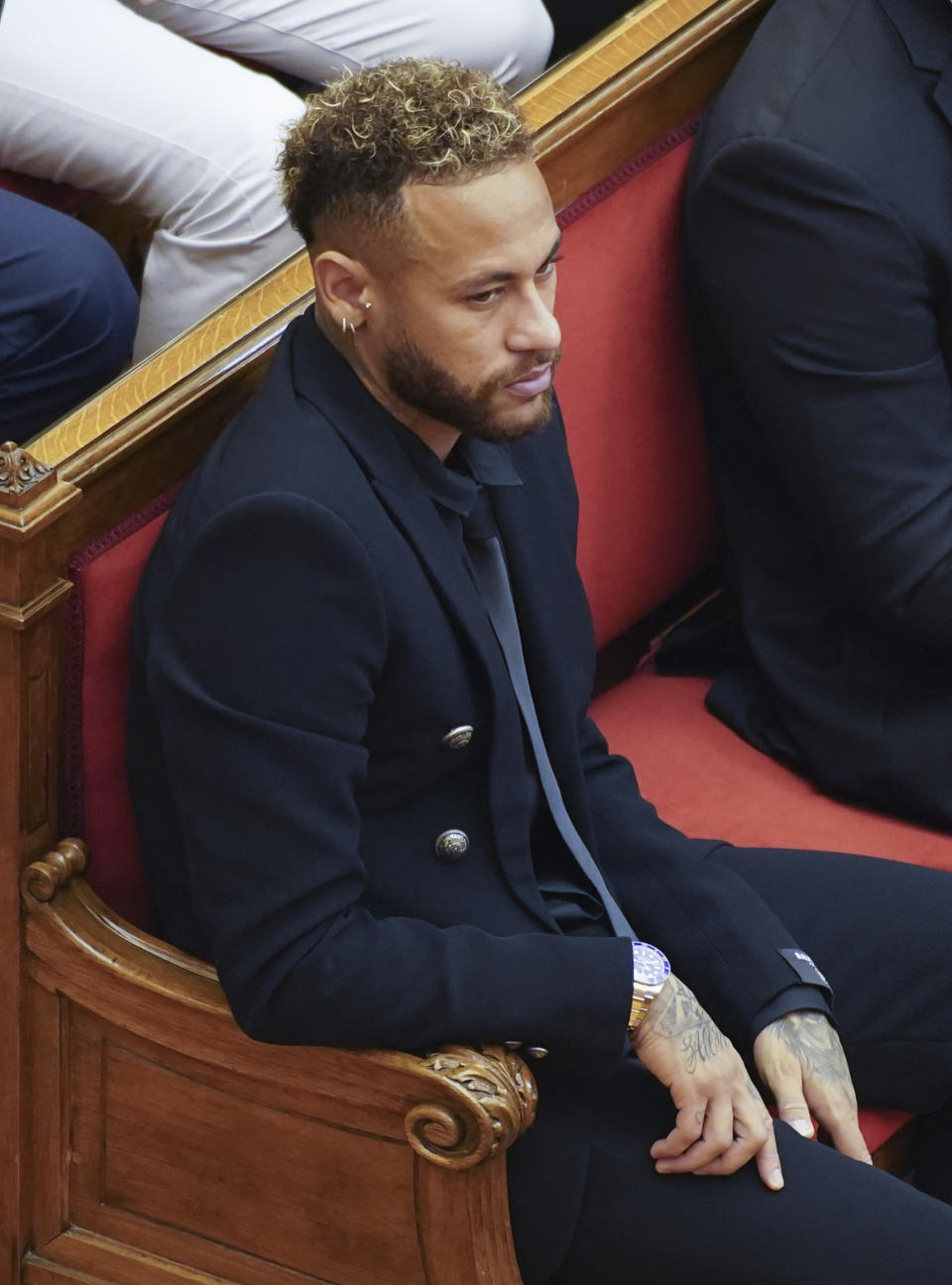 Former FC Barcelona player Neymar who now plays for Paris Saint-Germain sits in court in Barcelona, Spain, Monday Oct. 17, 2022. Neymar is in court to face a trial over alleged irregularities involving his transfer to Barcelona in 2013. Neymar's parents, former Barcelona president Sandro Rosell and representatives for both the Spanish club and Brazilian team Santos are also in court after a complaint brought by Brazilian investment group DIS regarding the amount of the player's transfer. All defendants have denied wrongdoing. (AP Photo/Joan Mateu Parra)