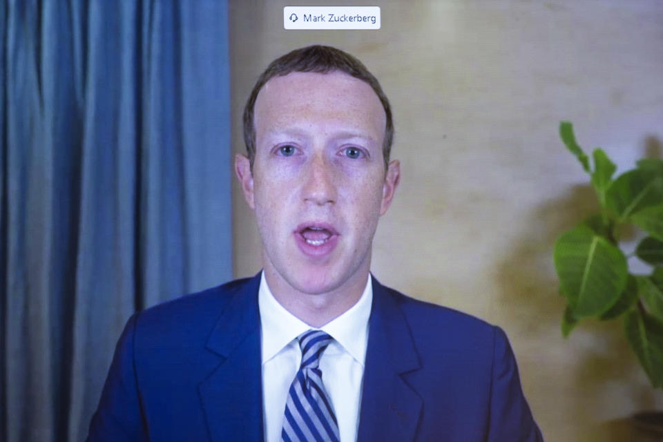 FILE - In this Oct. 28. 2020 file photo, Facebook CEO of Mark Zuckerberg appears on a screen as he speaks remotely during a hearing before the Senate Commerce Committee on Capitol Hill in Washington. (Michael Reynolds/Pool via AP)