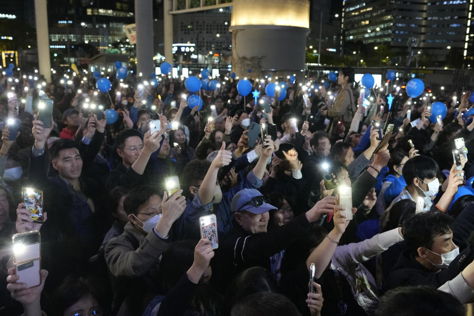 FILE - Supporters of main opposition Democratic Party cheer during the party's parliamentary election campaign in Seoul, South Korea, Tuesday, April 9, 2024. The parliamentary election will be held on April 10. South Korean voters have handed liberals extended opposition control of parliament in what looks like a massive political setback to conservative President Yoon Suk Yeol. Some experts say the results of Wednesday’s parliamentary elections make Yoon “a lame duck” — or even “a dead duck” — for his remaining three years in office. Others disagree, saying Yoon still has many policy levers and could aggressively push his foreign policy agenda. (AP Photo/Ahn Young-joon, File)