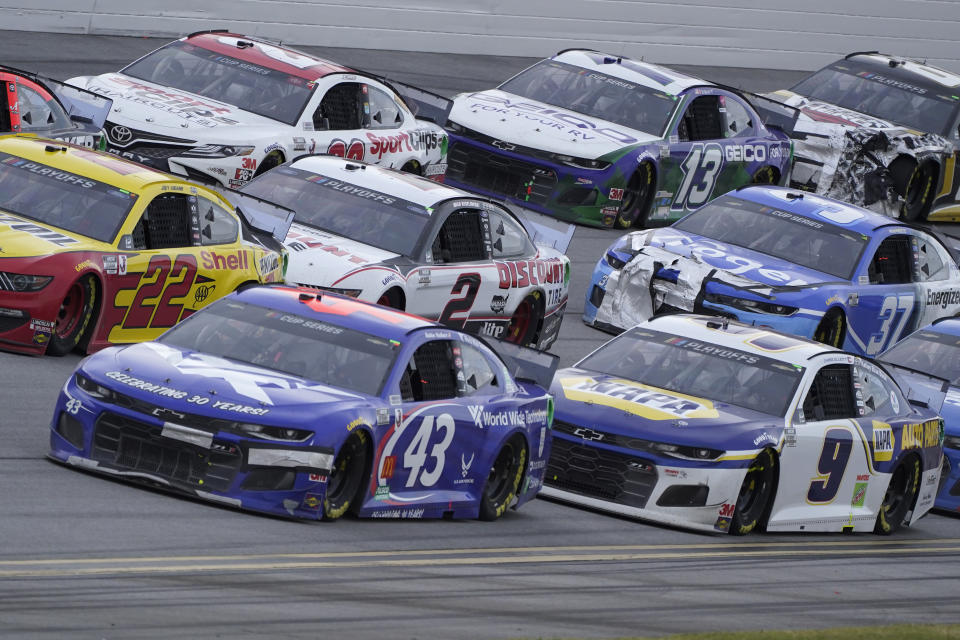 Bubba Wallace (43) drives in traffic during the YellaWood 500 NASCAR auto race at Talladega Superspeedway, Sunday, Oct. 4, 2020, in Talladega, Ala. (AP Photo/John Bazemore)