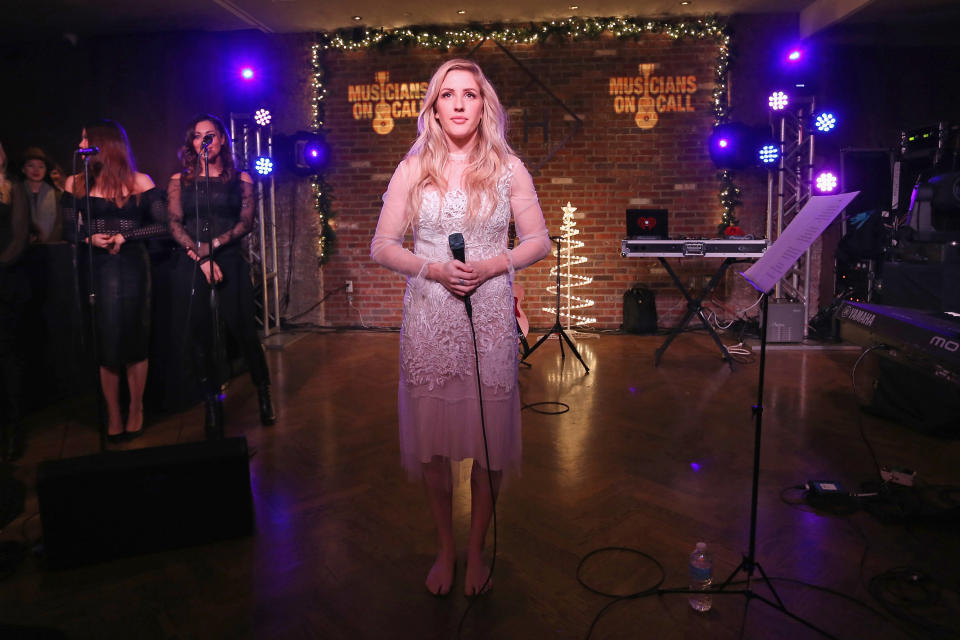 Ellie Goulding performs onstage during the Musicians On Call Deck The Halls Holiday Sweater Party at Kola House.