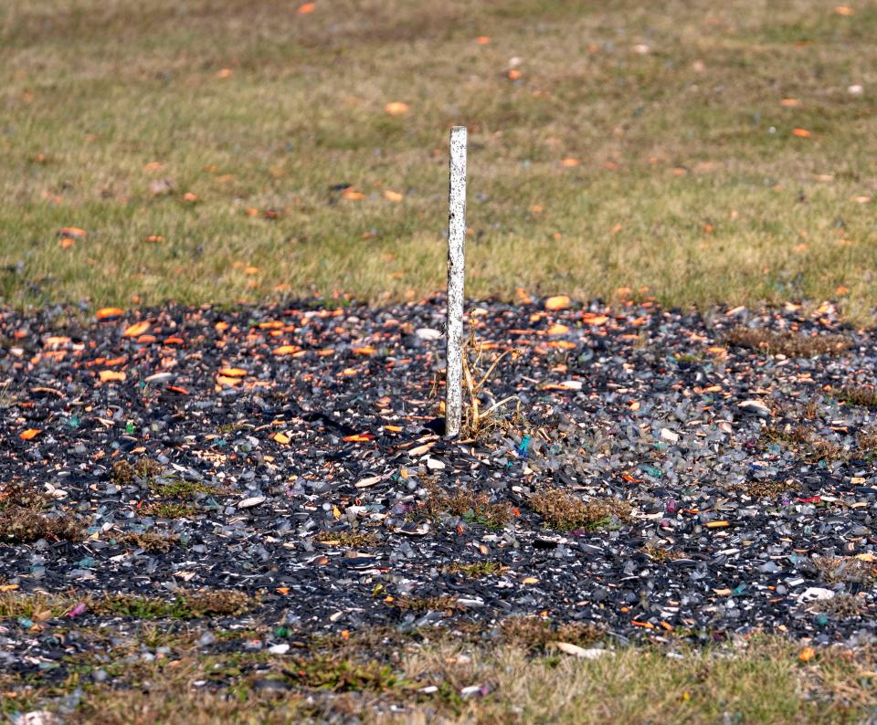 Random bits of clay “pigeons” and tiny lead balls on Sunday, Nov. 12, 2023, at the Atterbury Shooting Complex in Edinburgh. Lead is commonly used in shotgun shells and bullet rounds found here.