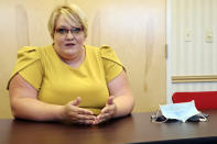 Kaylen Barker, chief lobbyist and communications manager for the Women's Health Center of West Virginia, reflects on the impact shutting down abortion services has had on staff and patients in the clinic's conference room on Wednesday, June 29, 2022 in Charleston, W.Va. (AP Photo/Leah Willingham)