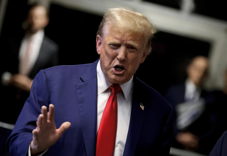 Former President Donald Trump speaks to reporters after exiting court for the day from his hush money trial in New York, Monday, May 6, 2024. (Peter Foley/Pool Photo via AP)