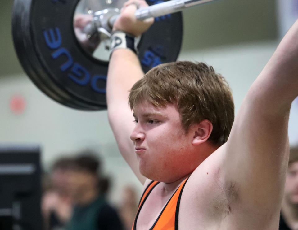 Spruce Creek High's Bradley Bingham holds his lift as he waits for the judges signal to drop it, Wednesday March 27, 2024 during District 3-3A boys weightlifting meet at Flagler Palm Coast High School.