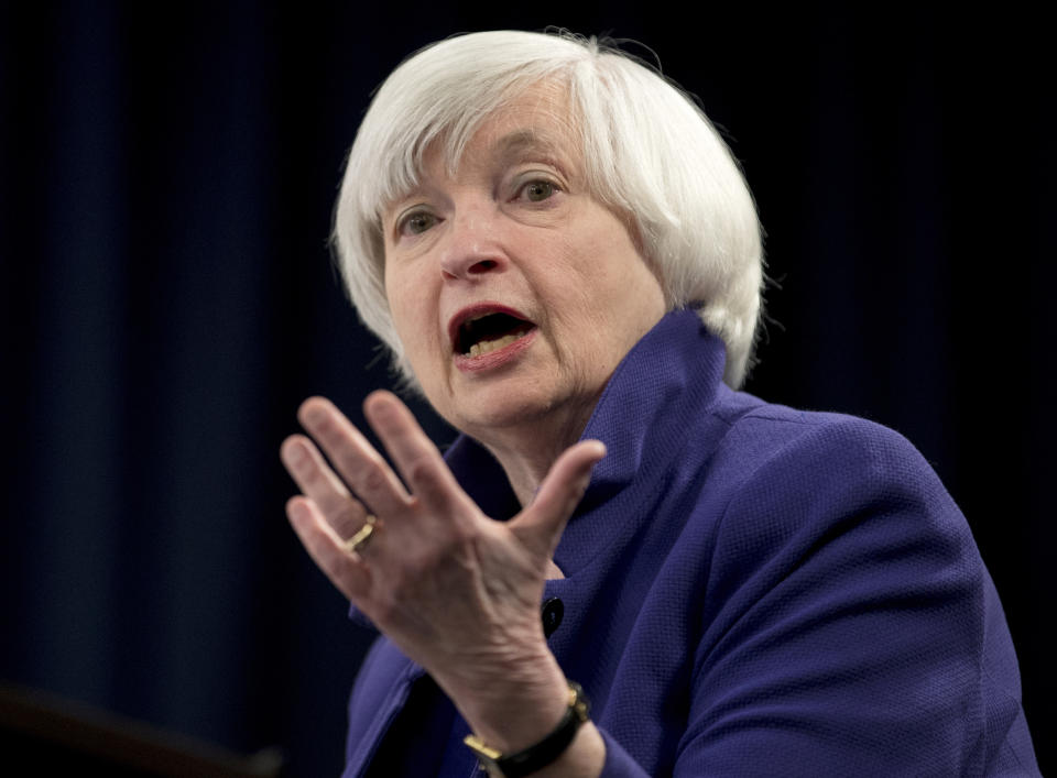 FILE - In this Dec. 13, 2017 file photo, Federal Reserve Chair Janet Yellen speaks during a news conference following the Federal Open Market Committee meeting in Washington. Yellen on Monday, April 5, 2021, urged the adoption of a minimum global corporate income tax, an effort to offset any disadvantages that might arise from the Biden administration’s proposed increase in the U.S. corporate tax rate. (AP Photo/Carolyn Kaster, File)