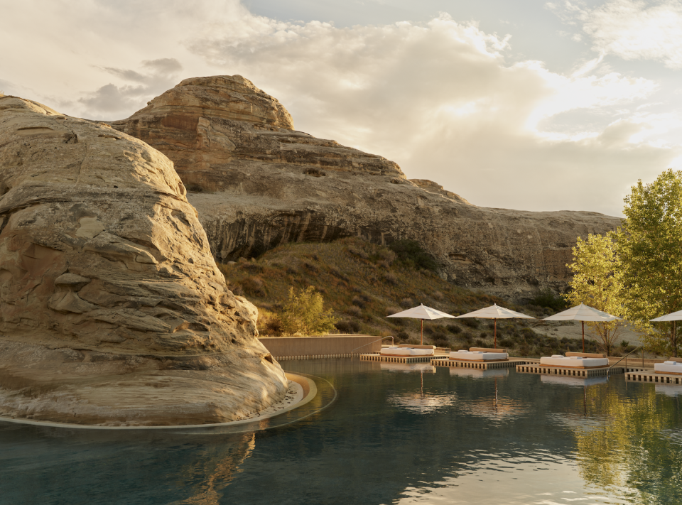 pool in front of large rock structure