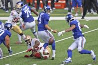 New York Giants quarterback Daniel Jones, center, and San Francisco 49ers' Kevin Givens (90) looks after a loose ball during the first half of an NFL football game, Sunday, Sept. 27, 2020, in East Rutherford, N.J. (AP Photo/Bill Kostroun)