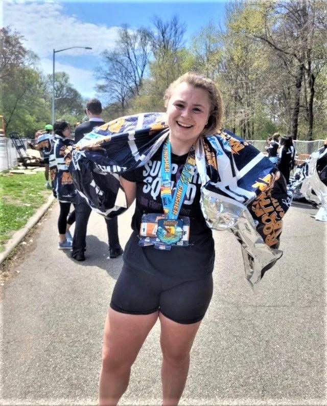 Rachel Ostrowski after completing the Brooklyn Marathon Sunday, April 24, 2022. The Hen Hud senior ran with her mother, Nicole Lopen, in honor of her dad, Walter Ostrowski, who has pancreatic cancer.