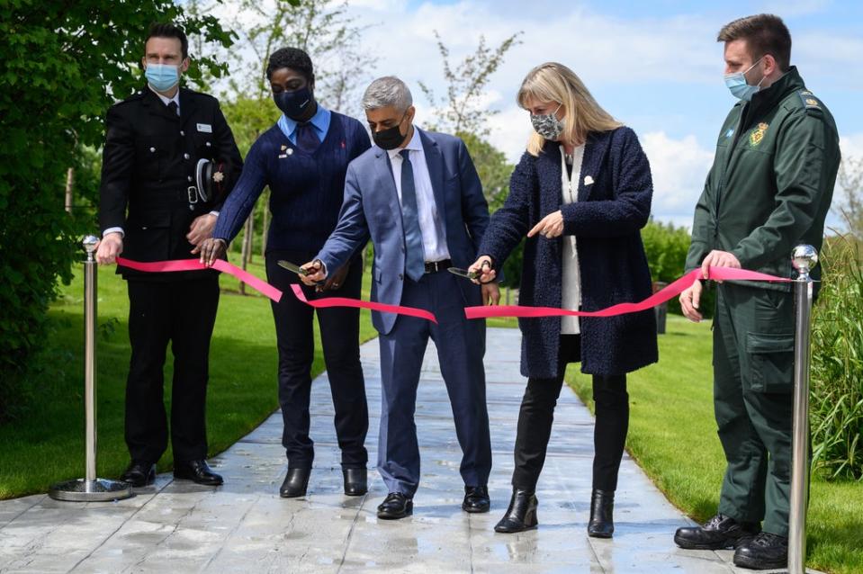 Sadiq Khan is accompanied by key workers as he opens the London covid memorial garden (Getty Images)