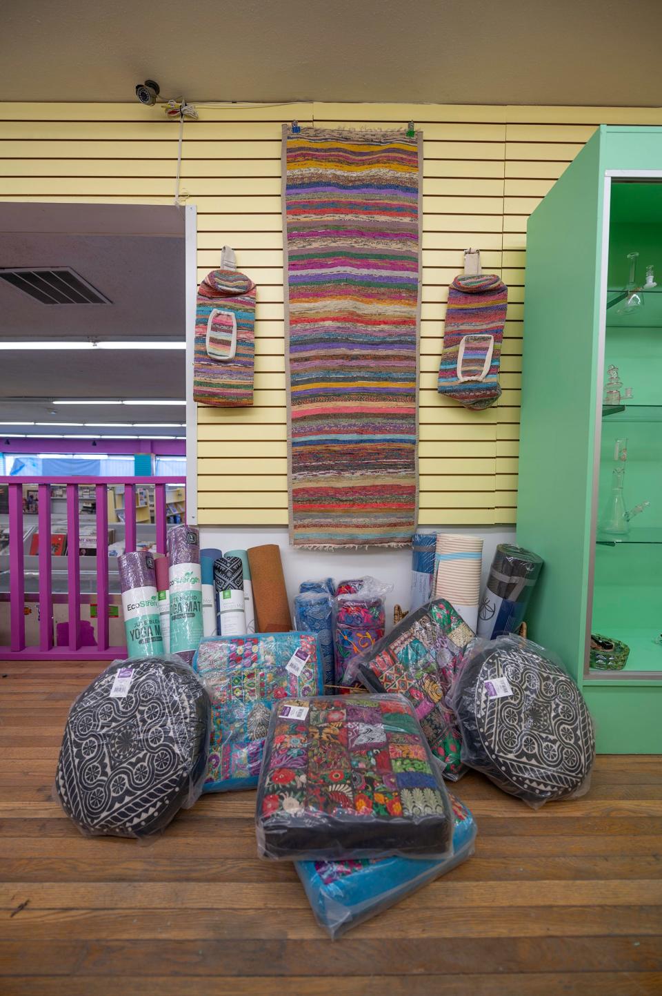 Yoga mats and mat carriers are displayed in the Zen space of the soon to open High Vibes Music & Zen Boutique located at 420 W. Fourth St. in Pueblo, Colo., on Thursday, May 4, 2023.