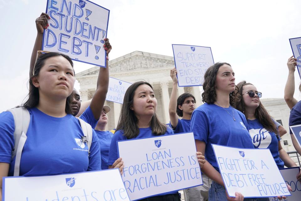 People demonstrate outside the Supreme Court, Friday, June 30, 2023, in Washington. Two conservative groups are asking a federal court to block the Biden administration’s plan to cancel $39 billion in student loans for more than 800,000 borrowers.