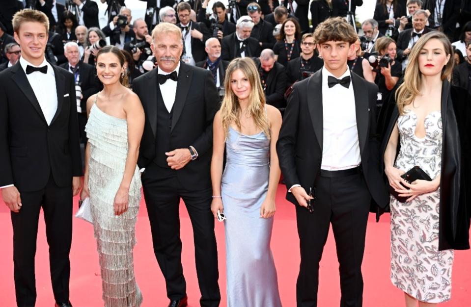 Cayden Wyatt Costner, Annie Costner, Kevin Costner, Grace Avery Costner, Hayes Costner, and Lily Costner attend the "Horizon: An American Saga" Red Carpet at the 77th annual Cannes Film Festival at Palais des Festivals on May 19, 2024.<p>Getty Images</p>