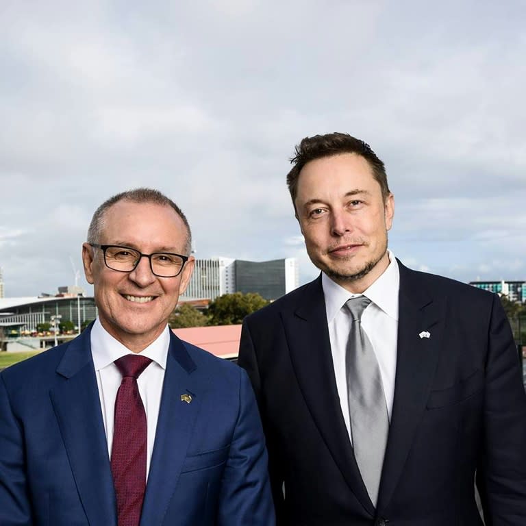 South Australia's Premier Jay Weatherill (L) and Tesla Motors CEO Elon Musk at an announcement in Adelaide on July 7, 2017