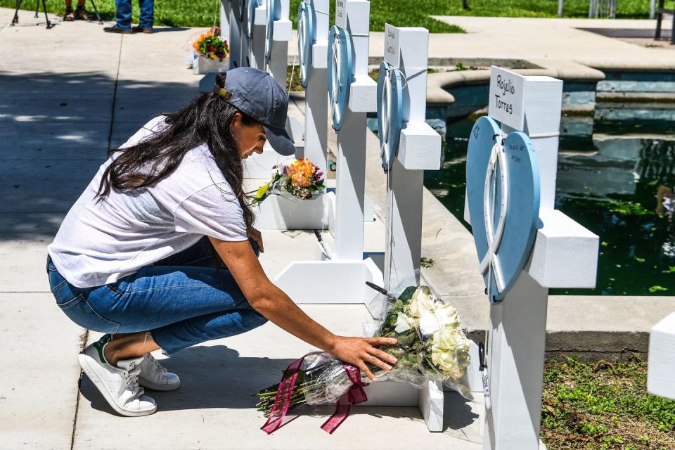 <p>In the aftermath of the <a href="https://www.townandcountrymag.com/society/politics/a40103927/uvalde-shooting-2022-how-to-help/" rel="nofollow noopener" target="_blank" data-ylk="slk:deadly school shooting in Uvalde, Texas;elm:context_link;itc:0;sec:content-canvas" class="link ">deadly school shooting in Uvalde, Texas</a>, Meghan <a href="https://www.townandcountrymag.com/society/tradition/a40119524/meghan-markle-uvalde-visit/" rel="nofollow noopener" target="_blank" data-ylk="slk:traveled to the small town to pay her respects in person.;elm:context_link;itc:0;sec:content-canvas" class="link ">traveled to the small town to pay her respects in person. </a> According to a spokesperson, the Duchess of Sussex took the trip in a "personal capacity as a mother," to offer "her condolences and support in person to a community experiencing unimaginable grief." She made a low-key appearance, wearing a white t-shirt, jeans, and a baseball cap, and quietly laid flowers at a makeshift memorial outside Uvalde County Courthouse. </p><p><a class="link " href="https://www.townandcountrymag.com/society/tradition/a40119524/meghan-markle-uvalde-visit/" rel="nofollow noopener" target="_blank" data-ylk="slk:Read more here;elm:context_link;itc:0;sec:content-canvas">Read more here</a></p>