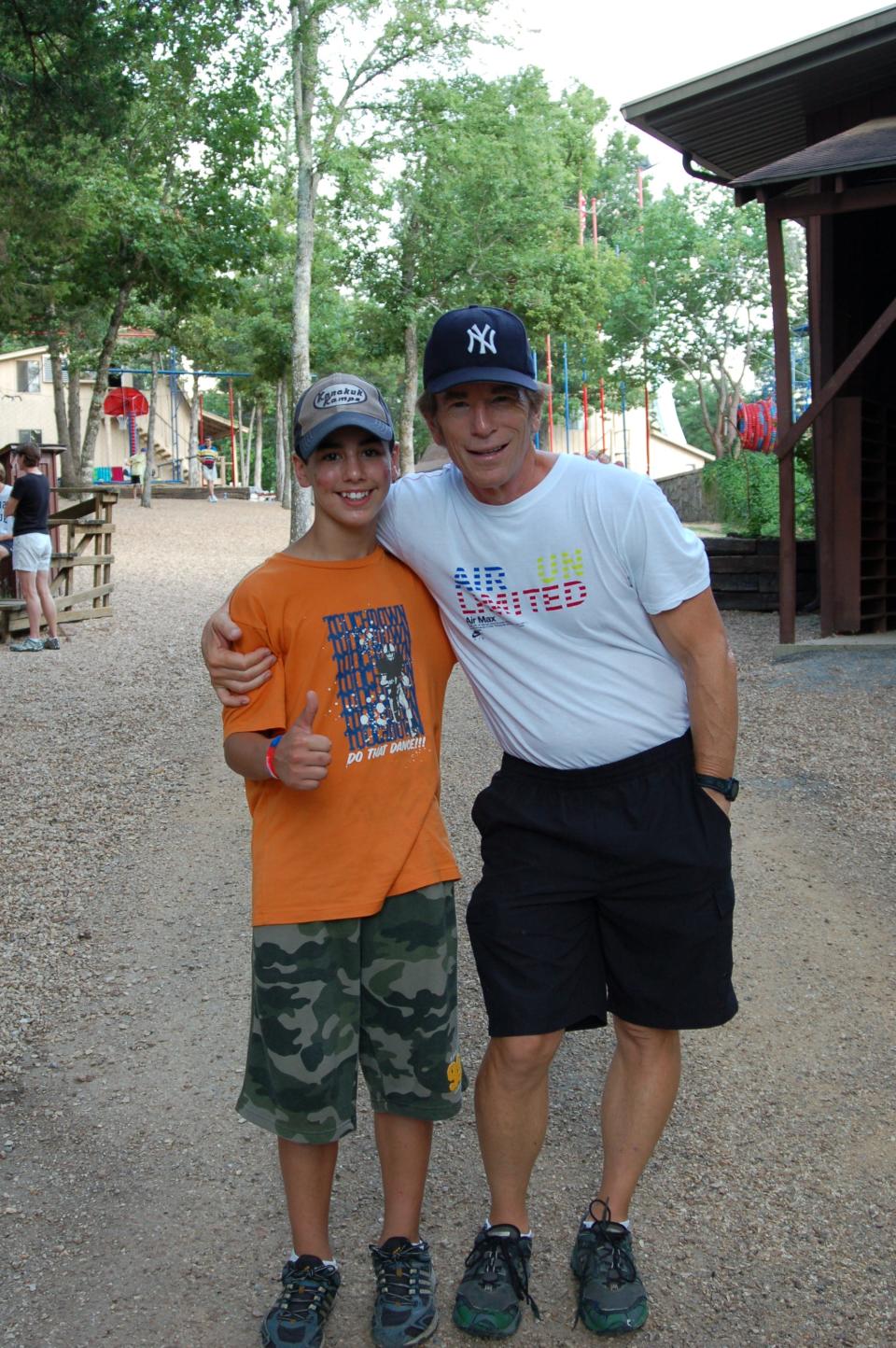 Ashton Alarcon, one of the Kanakuk campers abused by Pete Newman, poses with Kanakuk CEO Joe White.