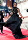 <p>Go with the flow! The <em>Black Panther</em> queen showed off her fluid moves in a gorgoeous black gown at the BAFTAs on Sunday night. (Photo: Samir Hussein/WireImage) </p>