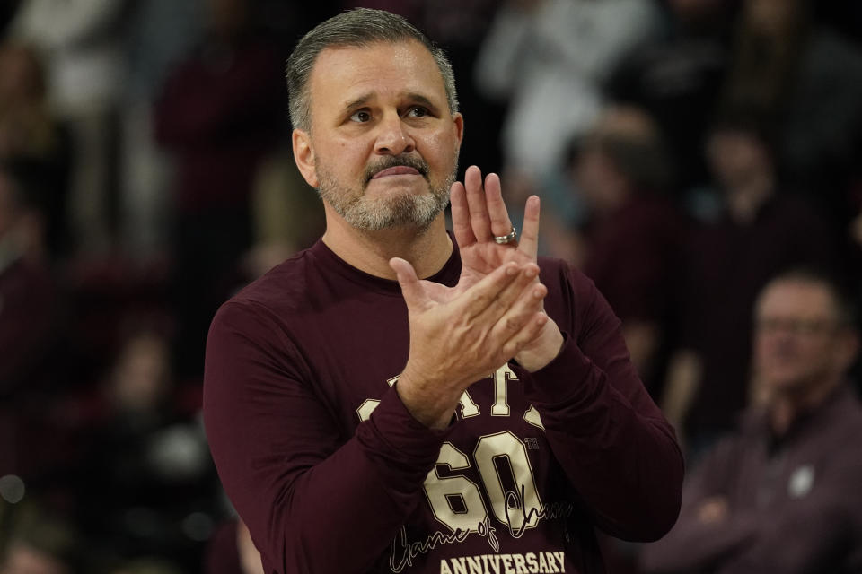 FILE - Mississippi State head coach Chris Jans salutes students and fans following the team's win over TCU in an NCAA college basketball game in Starkville, Miss., Saturday, Jan. 28, 2023. (AP Photo/Rogelio V. Solis, File)