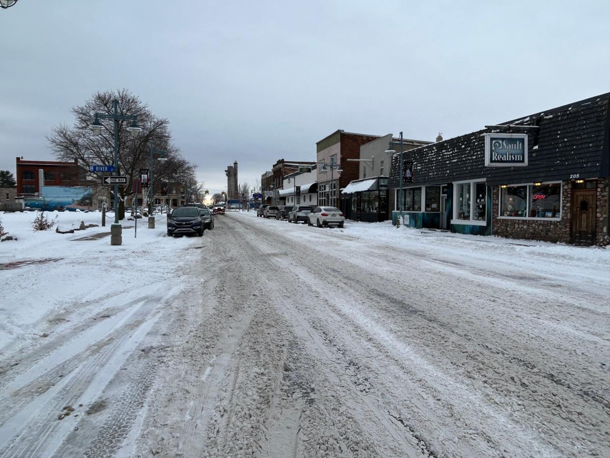 Portage Street in downtown Sault Ste. Marie is seen in the snow.