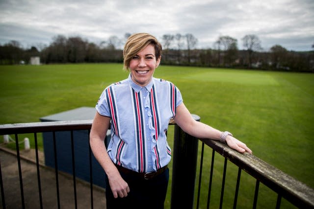 Clodagh Dunlop smiles with a field in the background