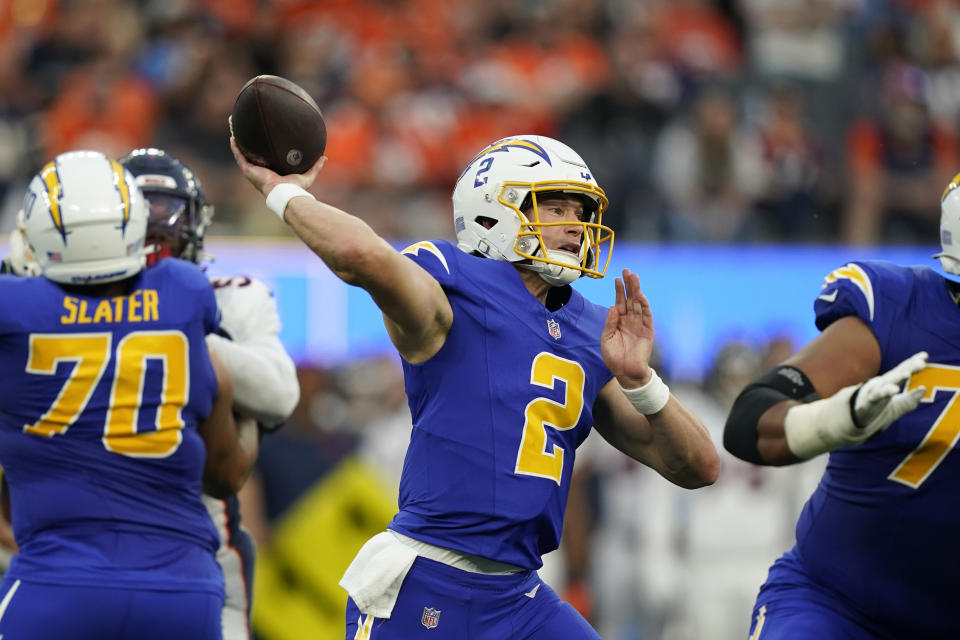 Los Angeles Chargers quarterback Easton Stick (2) passes during the second half of an NFL football game against the Denver Broncos, Sunday, Dec. 10, 2023, in Inglewood, Calif. (AP Photo/Ryan Sun)