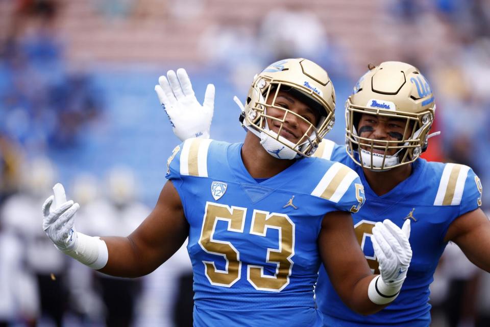 Darius Muasau #53 of the UCLA Bruins reacts after a tackle against the Alabama State Hornets