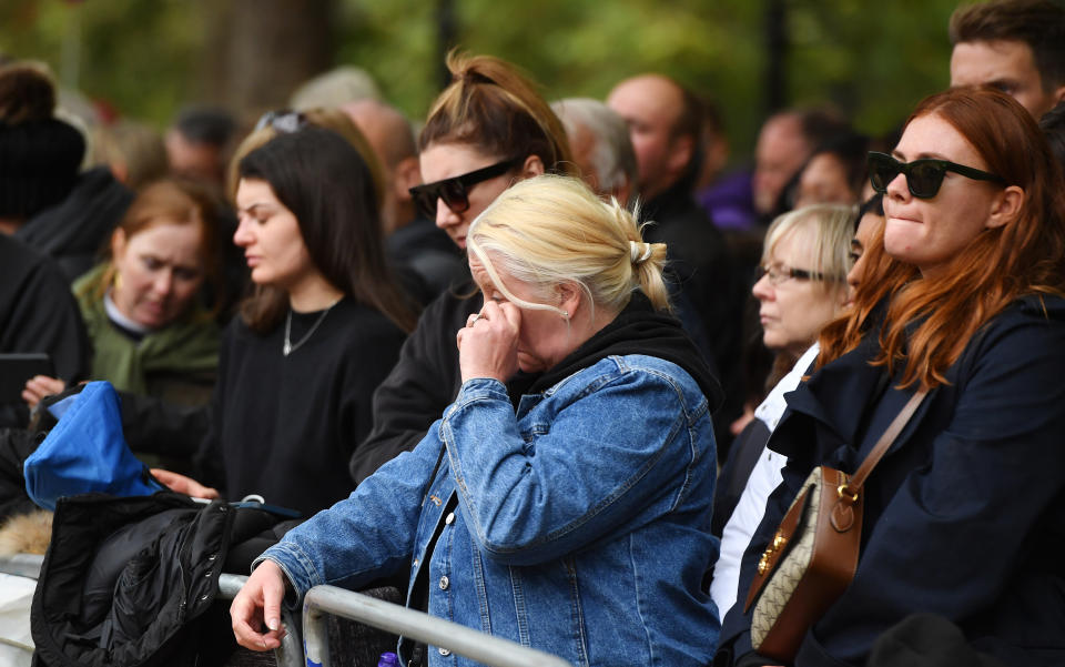 Members of the public in the crowd on The Mall, central London ahead of the State Funeral of Queen Elizabeth II. Picture date: Monday September 19, 2022.