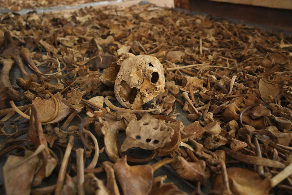 Newly discovered skulls and bones of some of those who were killed as they sought refuge inside the church displayed as a memorial to the thousands who were killed during the 1994 genocide, at a church, in Nyamata, Rwanda, Friday, April 5, 2024. An estimated 800,000 Tutsis were killed by extremist Hutus in massacres that lasted over 100 days in 1994. Some moderate Hutu who tried to protect members of the Tutsi minority were also targeted.(AP Photo/Brian Inganga)