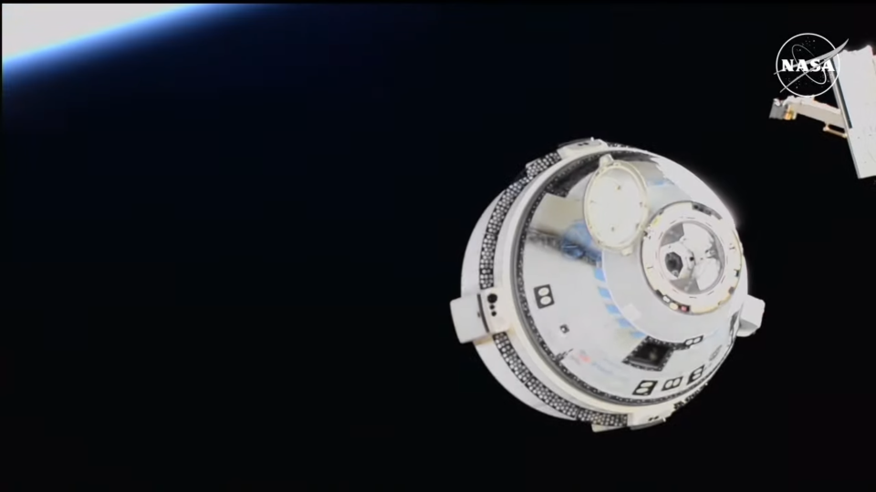 The Starliner capsule seen in space.