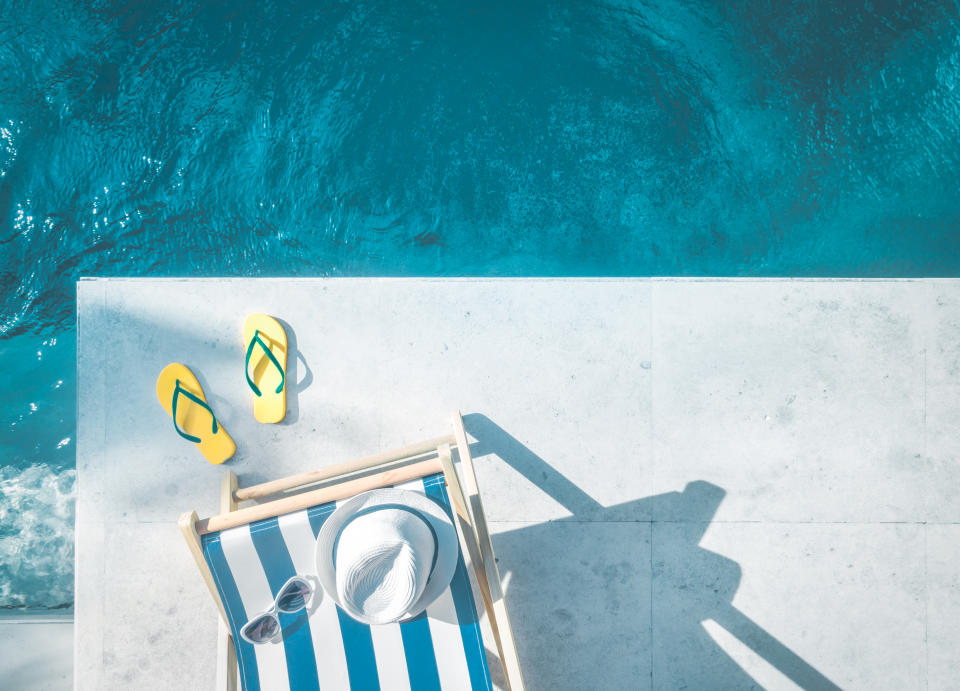 Aerial view of beach accessories next to the swimming pool