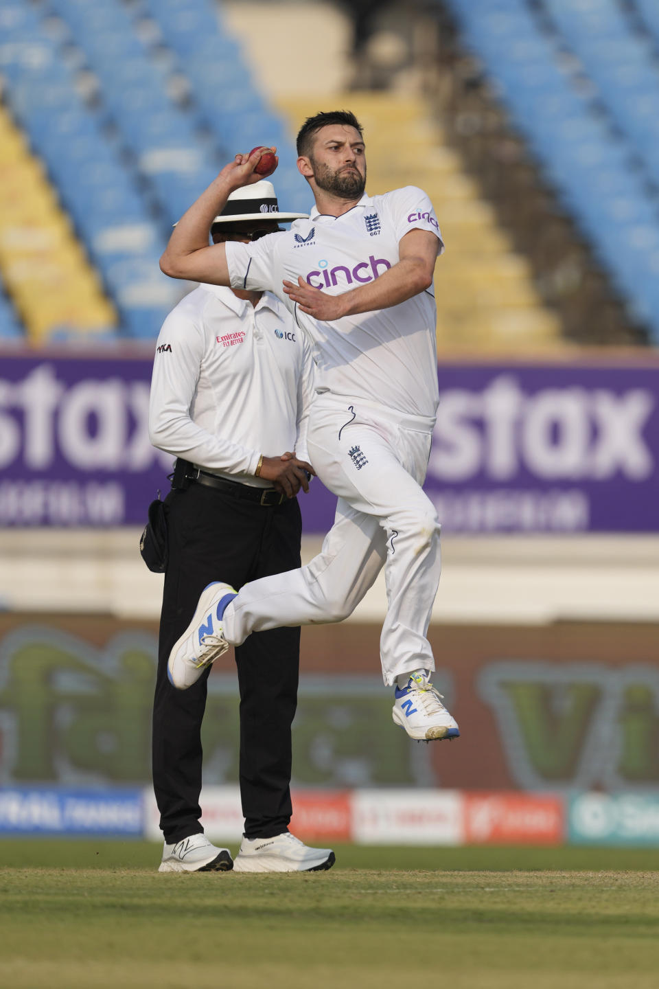 England's Mark Wood bowls on the first day of the third cricket test match between India and England in Rajkot, India, Thursday, Feb. 15, 2024. (AP Photo/Ajit Solanki)