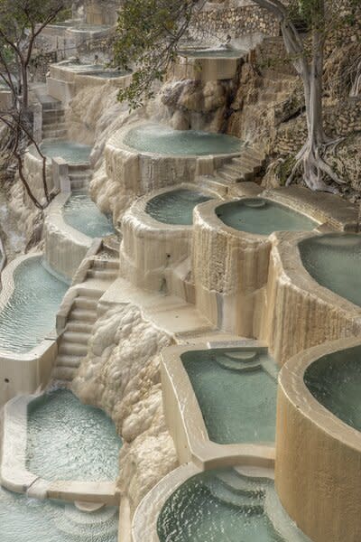 Grutas Tolantongo is a complex of natural hot springs, thermal pools, tunnels, and caves built into a box canyon in the mountains of central Mexico. The eco-resort runs under the cooperative <i>ejido</i> system, meaning it’s owned and operated by members of the local community.