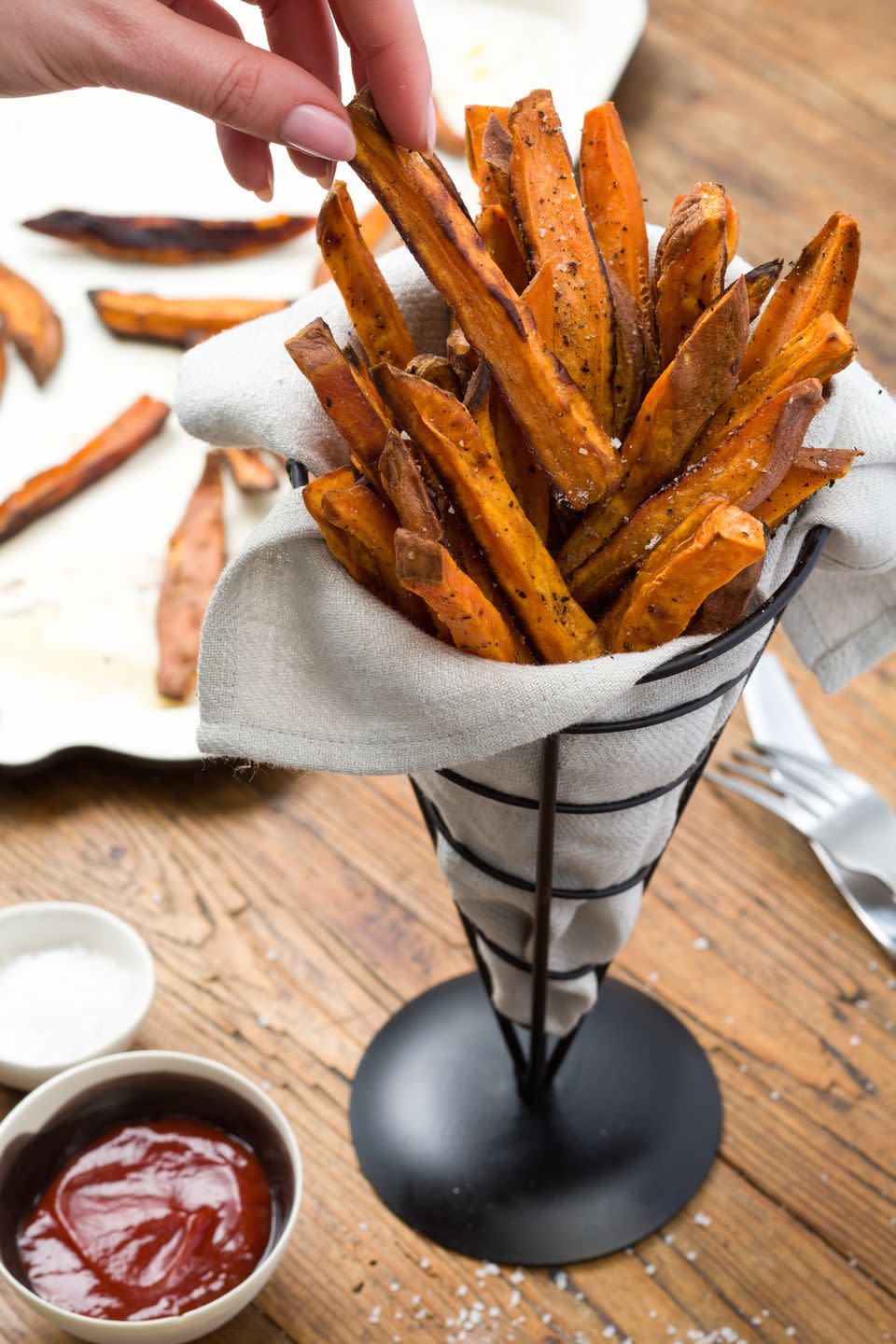 <p>Sweet potato fries beat <a href="https://www.delish.com/cooking/recipe-ideas/a23361078/how-to-make-french-fries/" rel="nofollow noopener" target="_blank" data-ylk="slk:French fries" class="link ">French fries</a> any day, and this recipe has a few tricks up its sleeves to get extra-crispy in the oven with no frying in sight! (Hint: A little cornstarch goes a long way.)</p><p>Get the <strong><a href="https://www.delish.com/cooking/recipe-ideas/recipes/a45026/salt-n-pepper-sweet-potato-fries-recipe/" rel="nofollow noopener" target="_blank" data-ylk="slk:Salt 'n' Pepper Sweet Potato Fries recipe" class="link ">Salt 'n' Pepper Sweet Potato Fries recipe</a></strong>.</p>