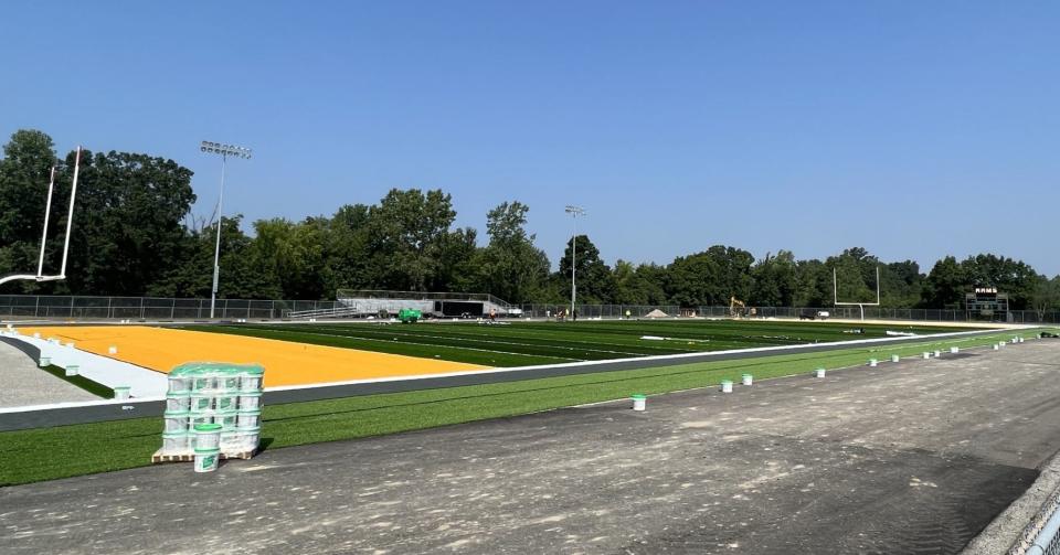 The new artificial turf football field at Flat Rock High School was nearing completion last week.