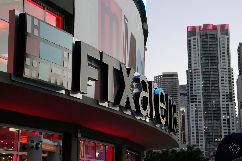 The FTX logo is shown on the FTX Arena, where the Miami Heat NBA basketball team play, Tuesday, Dec. 6, 2022, in Miami. (AP Photo/Lynne Sladky) ORG XMIT: FLLS201