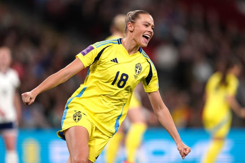 Sweden's Fridolina Rolfo celebrates scoring their side's first goal during the UEFA Women's Euro 2025 qualifying soccer match between England and Sweden at Wembley Stadium, London. Bradley Collyer/PA Wire/dpa