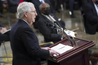 Senate Minority Leader Mitch McConnell of Ky., speaks as people gather to pay respects to former Sen. Bob Dole as he lies in state in the Rotunda of the U.S. Capitol in Washington, Thursday, Dec. 9, 2021. (Sarahbeth Maney/The New York Times via AP, Pool)