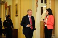 Sen. Lindsey Graham (R-SC) walks from the Senate floor after the end of the day's Senate impeachment trial of President Donald Trump in Washington