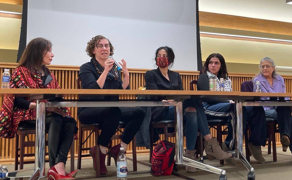 A forum hosted by Jewish Voices for Peace-Detroit was held April 30th, 2023, at Bloomfield Township Public Library to discuss the debate over attorney Huwaida Arraf's talks at Bloomfield Hills high school in March. Left to right:  Palestinian-American educator and activist, Lori Ajlouny; Rabbi Alana Alpert, who is speaking in the photo; Arraf; student Mariam Aladlouni; civil rights attorney, Barbara Harvey.