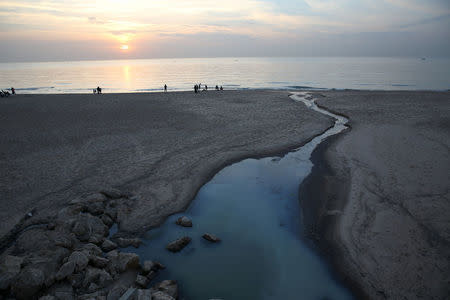 Sewage water streams into the sea at public beach Ramlet al Bayda, in Beirut, Lebanon November 20, 2016. Sally Hayde/Thomson Reuters Foundation via REUTERS