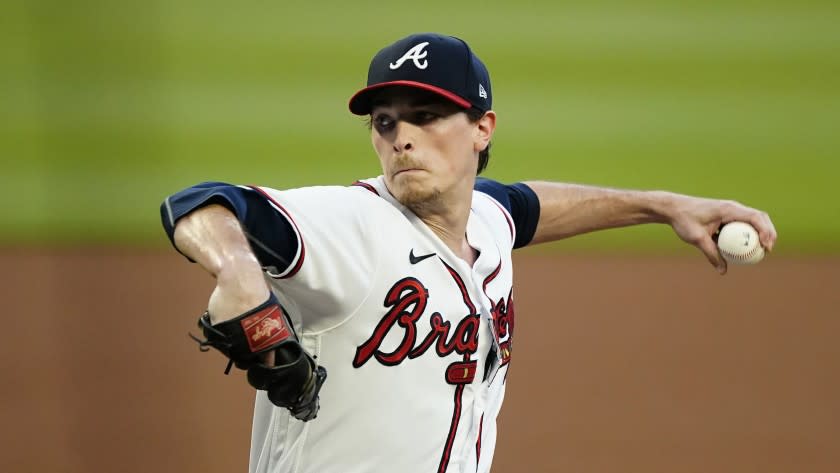 Atlanta Braves starting pitcher Max Fried (54) delivers.