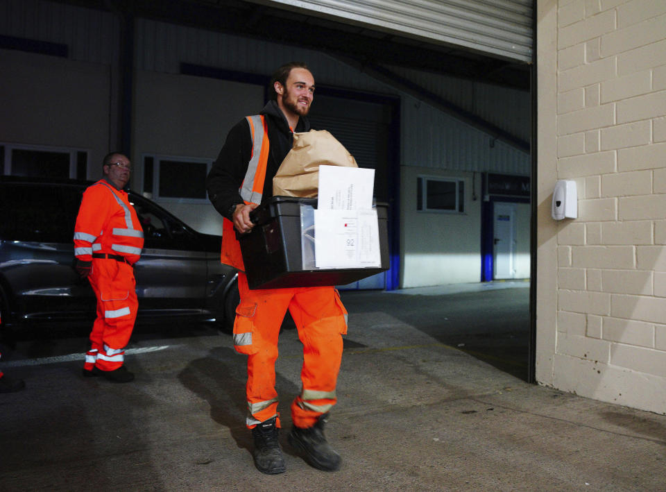 Ballot boxes arrive at the Bath & West Showground in Shepton Mallet, Somerset, England, as counting begins in the Somerton and Frome by-election, called following the resignation of David Warburton amid allegations of sexual harassment and cocaine use, Thursday July 20, 2023. Voters went to the polls Thursday in three electoral districts of England, with the governing Conservative Party braced for a drubbing over a cost-of-living crisis and a morale-sapping string of political scandals. (Ben Birchall/PA via AP)