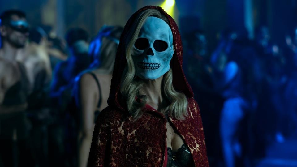 Verna in skull mask in The Fall Of The House Of Usher