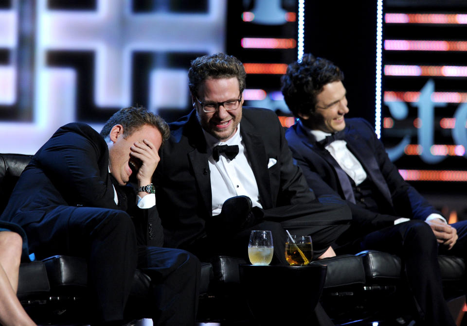 CULVER CITY, CA - AUGUST 25:  (L-R) Actor Jonah Hill, roast master Seth Rogen and roastee James Franco onstage during The Comedy Central Roast of James Franco at Culver Studios on August 25, 2013 in Culver City, California. The Comedy Central Roast Of James Franco will air on September 2 at 10:00 p.m. ET/PT.  (Photo by Kevin Winter/Getty Images for Comedy Central)