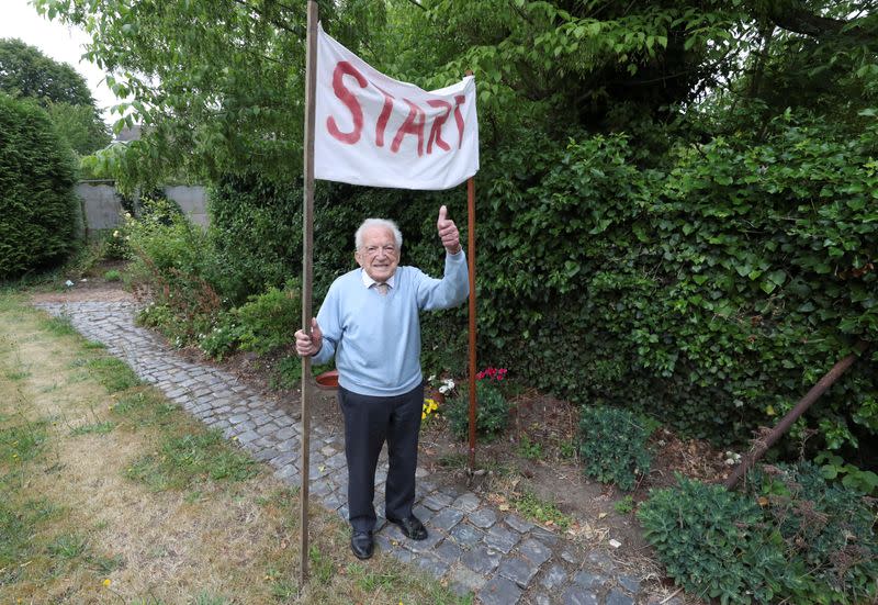 Alfons Leempoels walks the equivalent of a marathon in his garden to raise money to fight against the coronavirus disease (COVID-19) in Rotselaar