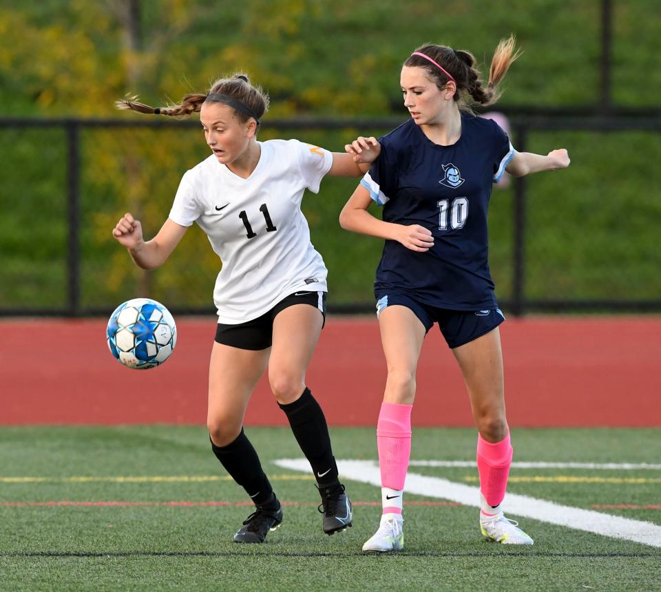 SANDWICH  10/07/21  Olivia Avellar of Nauset controls the ball in front of McKena Clark of Sandwich.