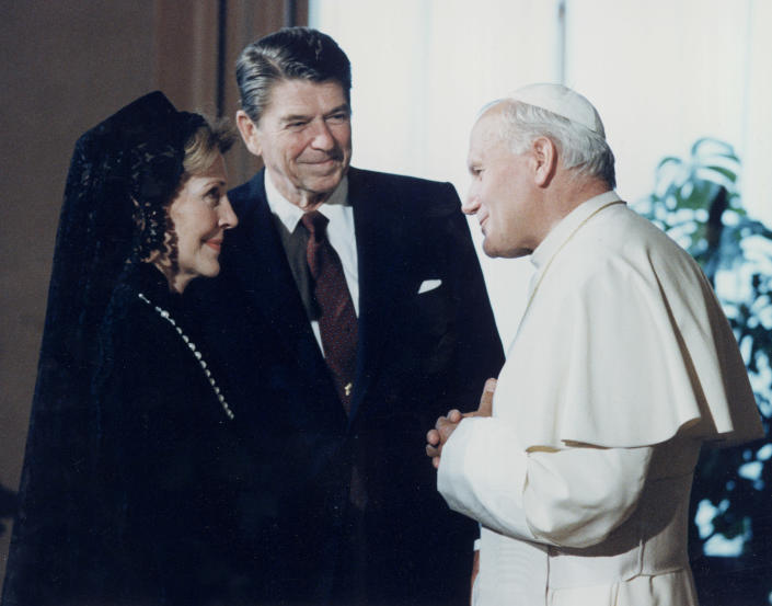 FILE - In this June 7, 1982 file photo, President Ronald Reagan and his wife, first lady, Nancy Reagan, meet Pope John Paul II at the Vatican. President Joe Biden is scheduled to meet with Pope Francis on Friday, Oct. 29, 2021. Biden is only the second Catholic president in U.S. history. (AP Photo, File)