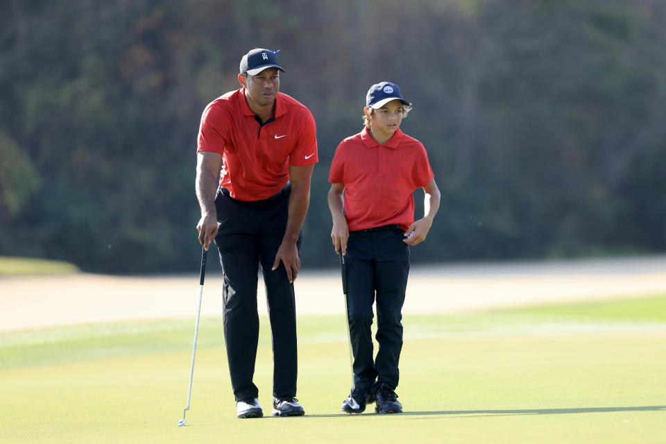 Seen here, Tiger Woods playing alongside his son Charlie in the PNC Championship in December, 2021.