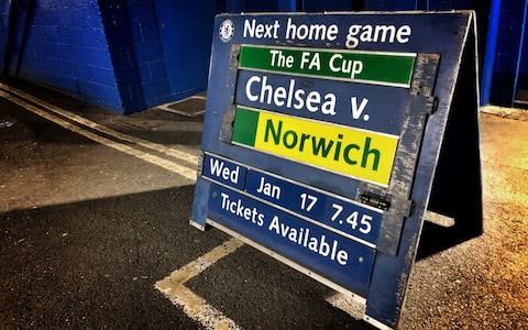 A board outside the stadium prior to The Emirates FA Cup Third Round Replay between Chelsea and Norwich City at Stamford Bridge on January 17 - Credit: Getty